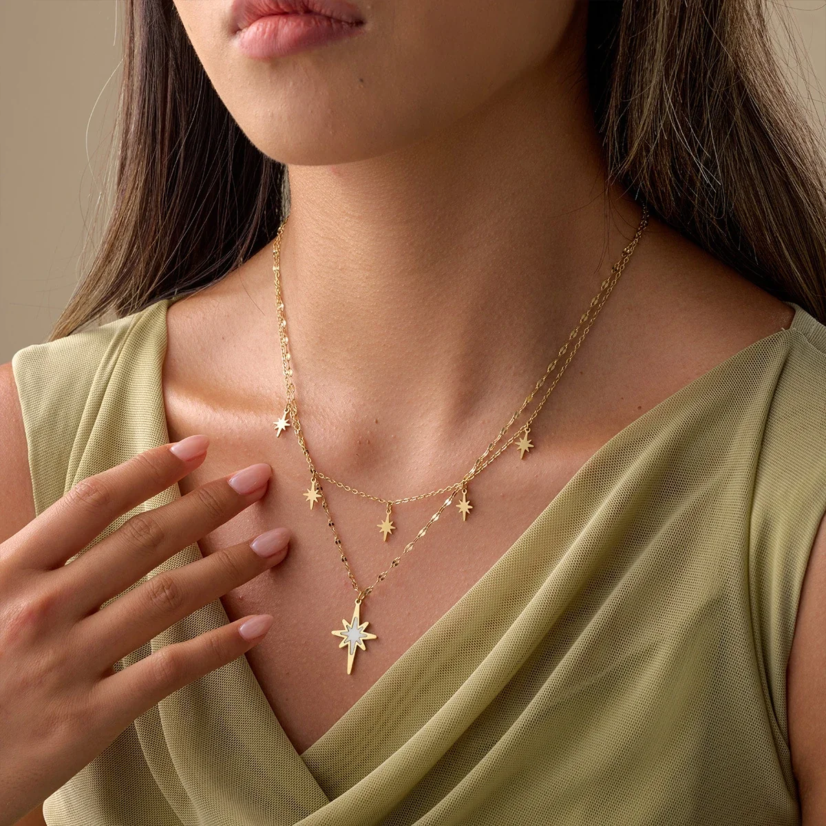 Ketting met gelaagde achtpuntige sterren, 18K verguld staal productfoto