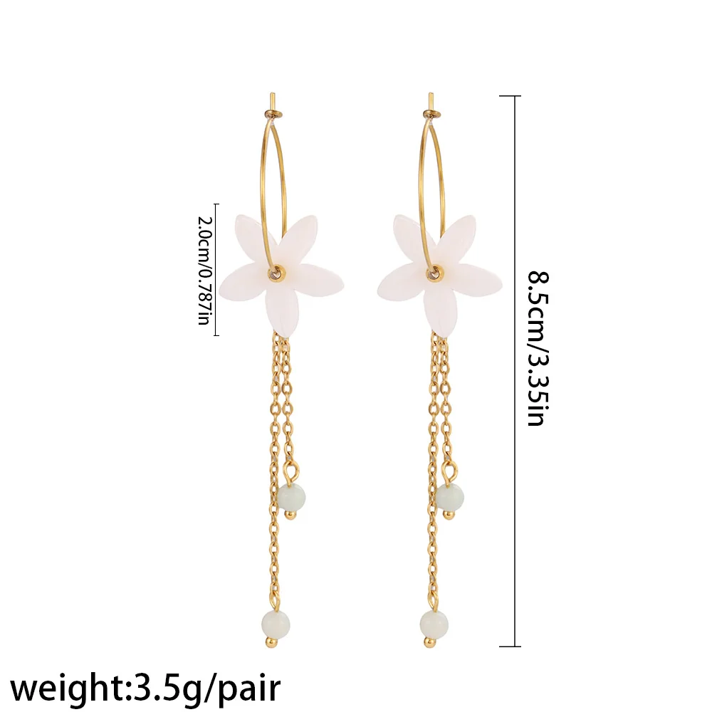 Photo produit : Créoles fleur, fleurs blanches, acier inoxydable 316 PVD or 18K
