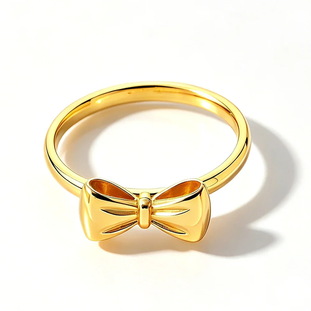 Bow Ring with Sculpted Ribbon Loops in Gold-Plated Steel