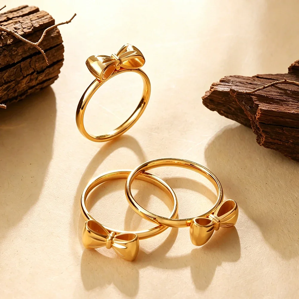 Bow Ring with Sculpted Ribbon Loops in Gold-Plated Steel