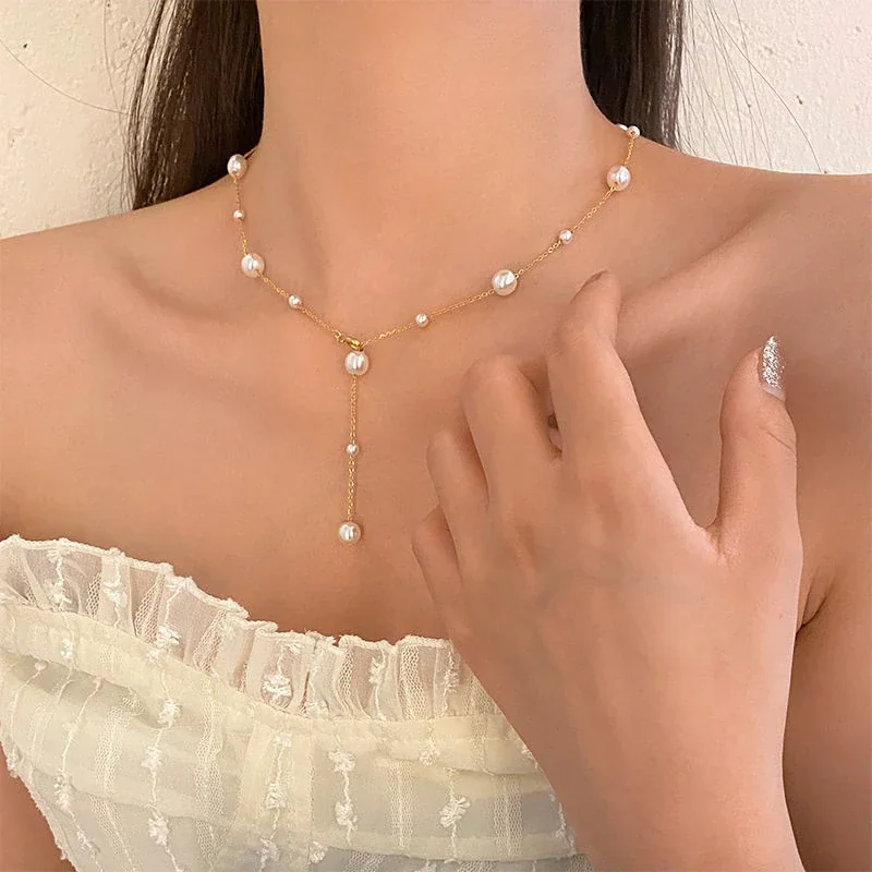 Foto del producto: Collar de acero inoxidable chapado en oro con cadena O y caída en Y de perlas
