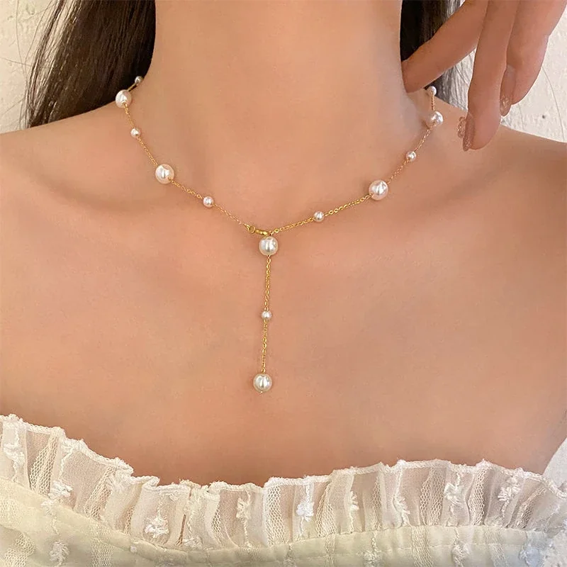 Foto del producto: Collar de acero inoxidable chapado en oro con cadena O y caída en Y de perlas