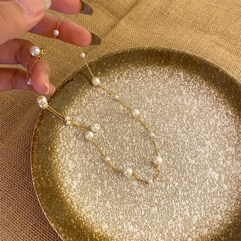 Foto del producto: Collar de acero inoxidable chapado en oro con cadena O y caída en Y de perlas