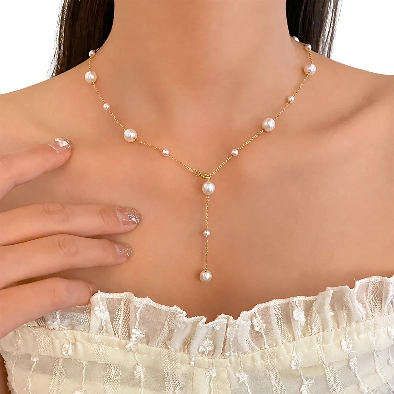 Foto del producto: Collar de acero inoxidable chapado en oro con cadena O y caída en Y de perlas