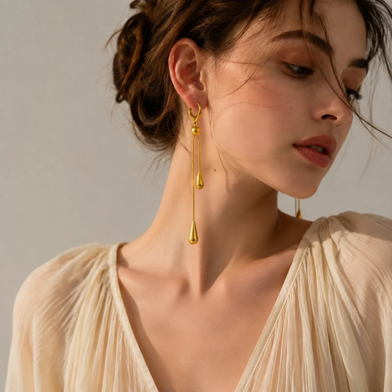Photo produit : Boucles d'oreilles pendantes en acier inoxydable plaqué or à doubles gouttes