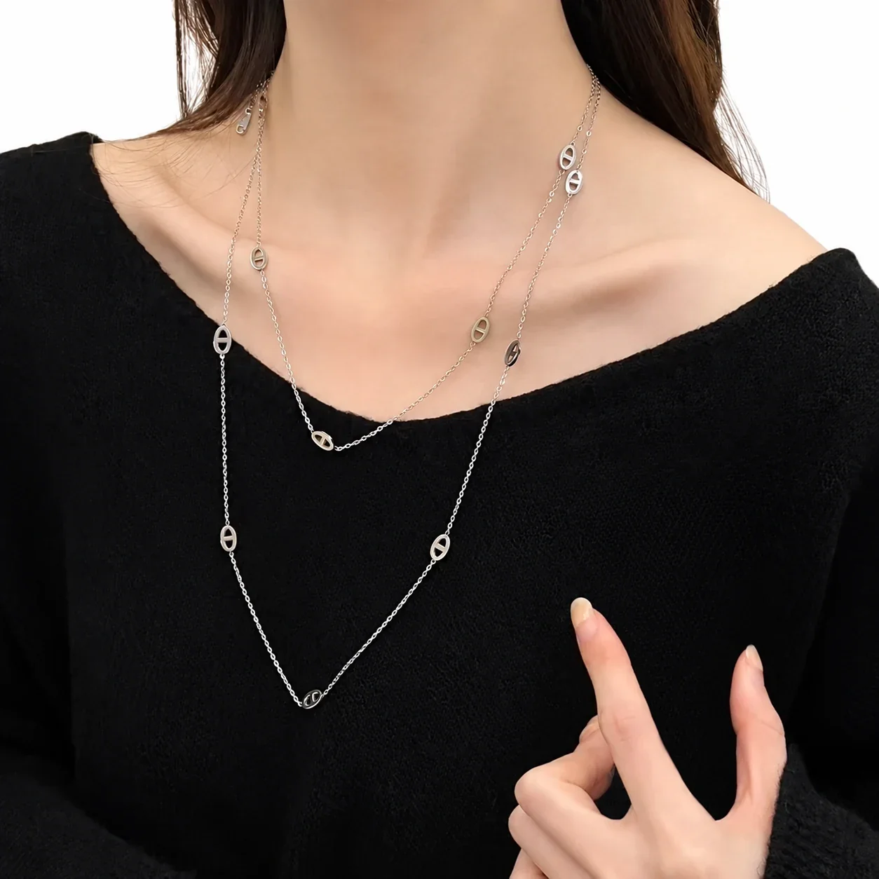 Gelaagde ketting met ovale openwerkmotieven, verguld productfoto