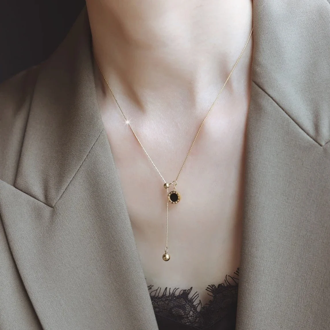 Hangerketting met Omkeerbare Zwarte Schijf van Verguld Roestvrij Staal productfoto