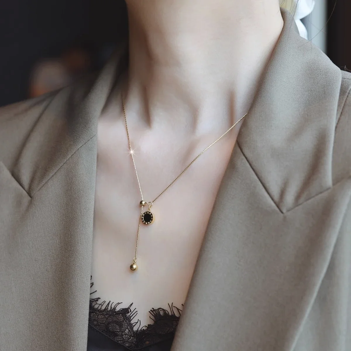 Hangerketting met Omkeerbare Zwarte Schijf van Verguld Roestvrij Staal productfoto
