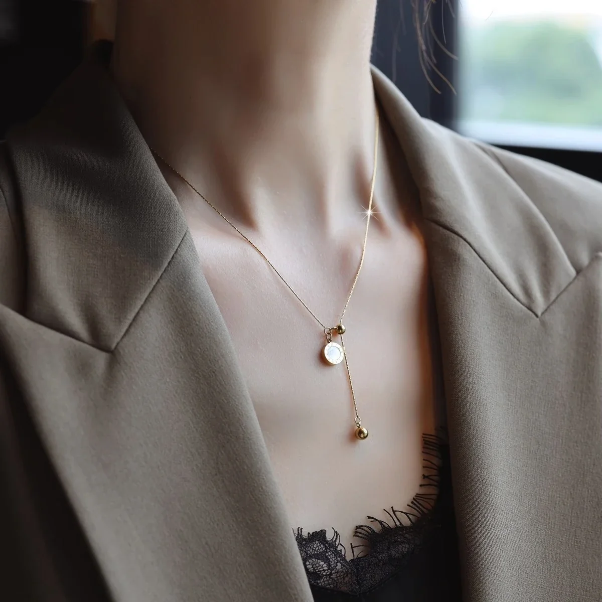 Hangerketting met Omkeerbare Zwarte Schijf van Verguld Roestvrij Staal productfoto