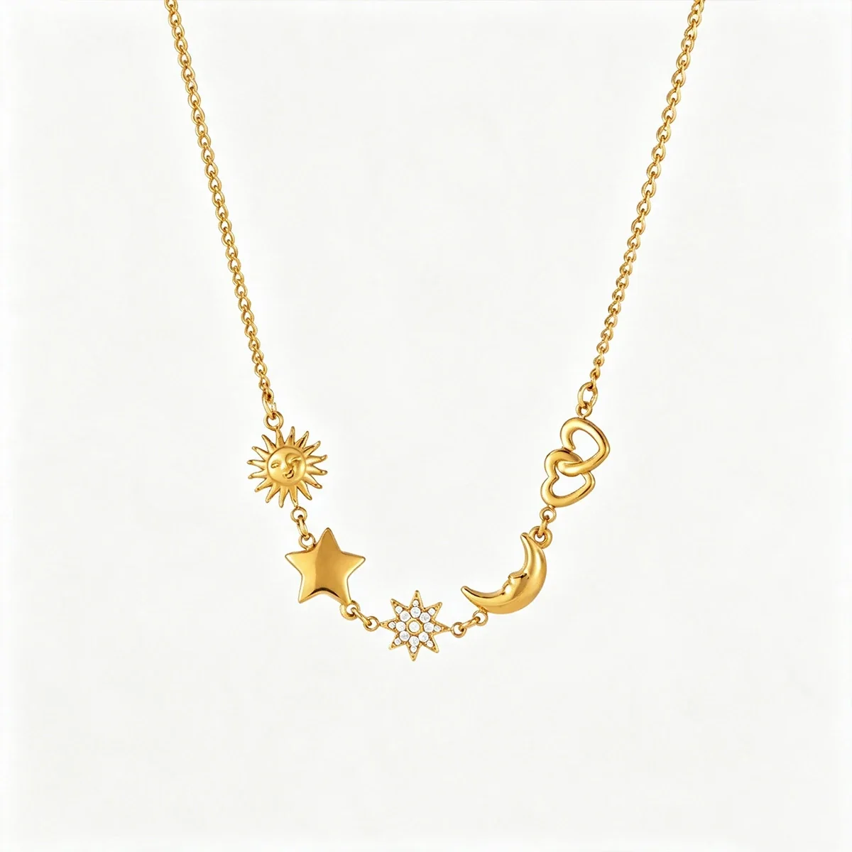 Ketting met zon-, ster- en maanmotieven in 18K verguld staal
