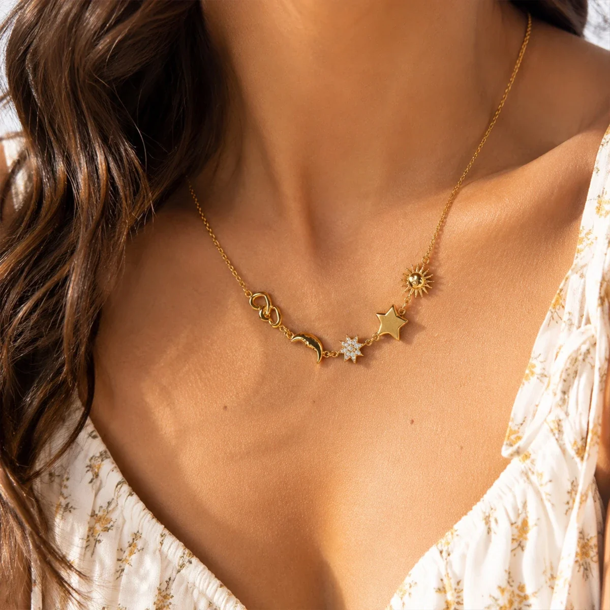 Ketting met zon-, ster- en maanmotieven in 18K verguld staal productfoto