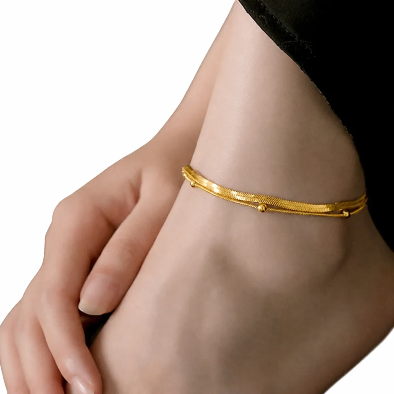 Sleek Stainless Steel Gold-Tone Herringbone Bead Anklet