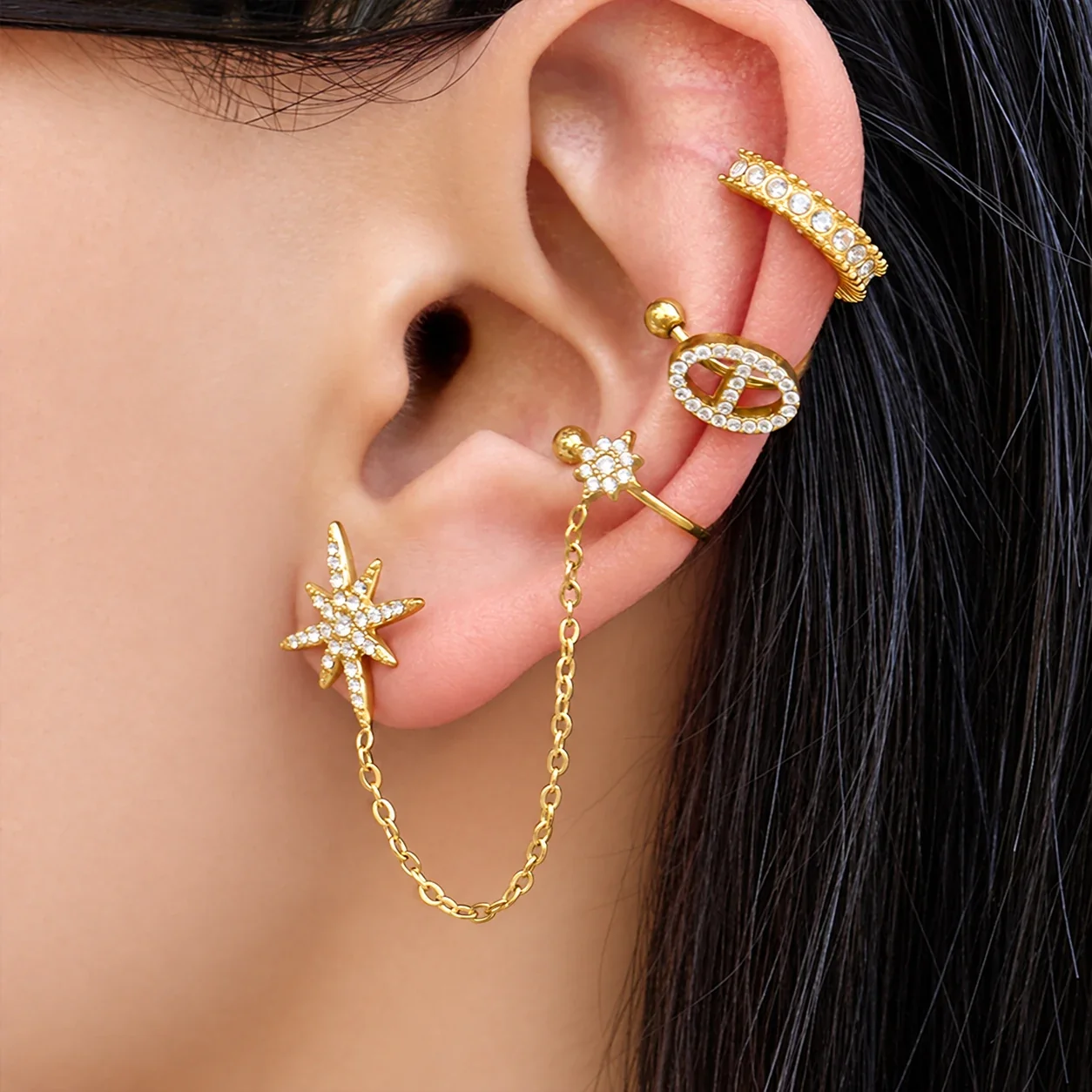Ear cuff met sterstud en ketting, 18K verguld staal productfoto