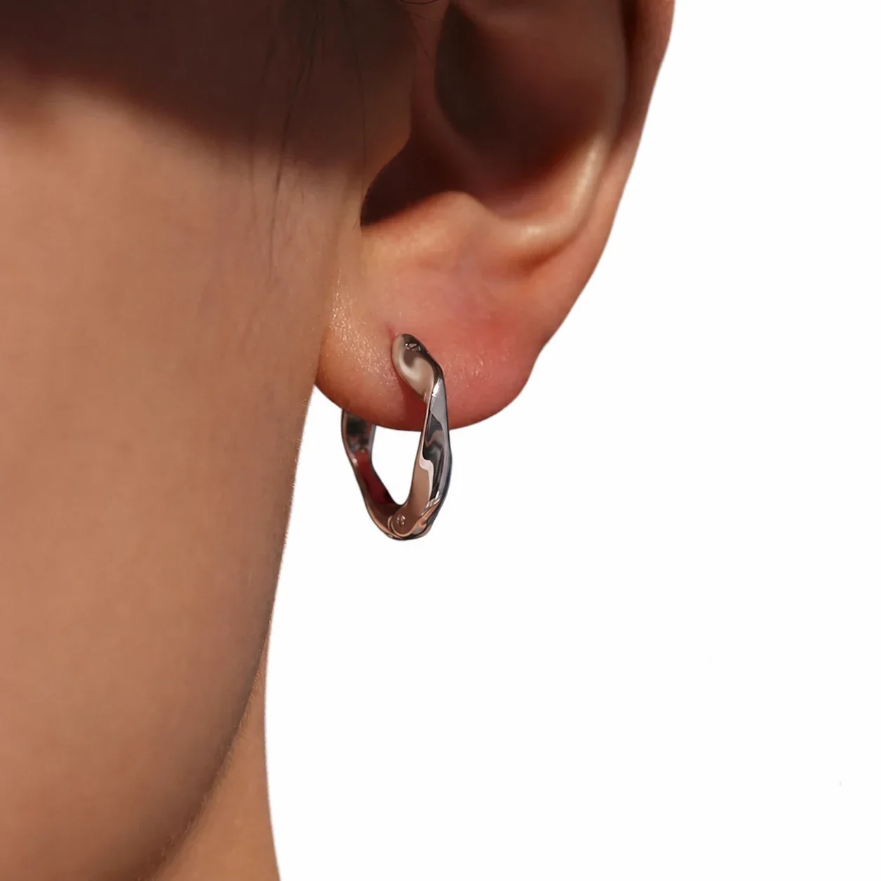 Sculptural Stainless Steel Twisted Latch Hoop Earrings