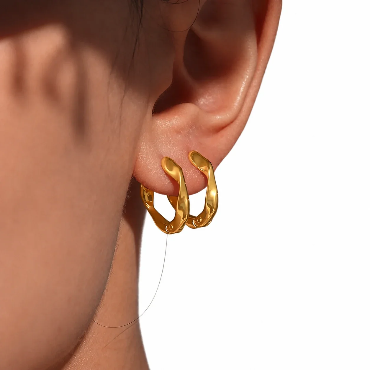 Sculptural Stainless Steel Twisted Latch Hoop Earrings