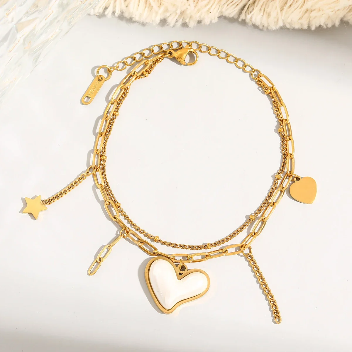 Foto del producto: Pulsera de charms con cadenas en capas, corazón y estrella, acero inoxidable