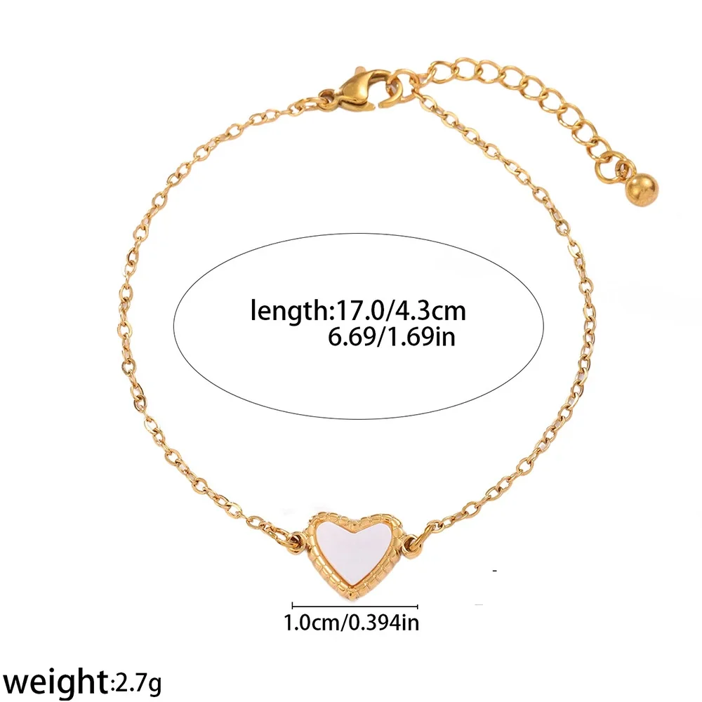 Photo produit : Bracelet croix plaqué or avec incrustation blanche, acier inoxydable 316