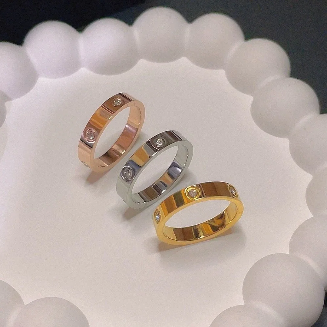 Ring: Six Cubic Zirconia Bezel-Set Flat Band Stainless Steel