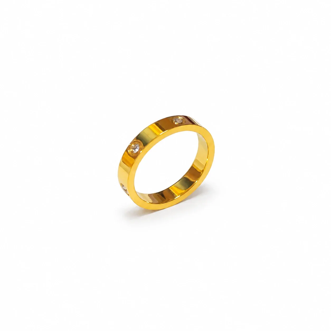 Ring: Six Cubic Zirconia Bezel-Set Flat Band Stainless Steel - Gold