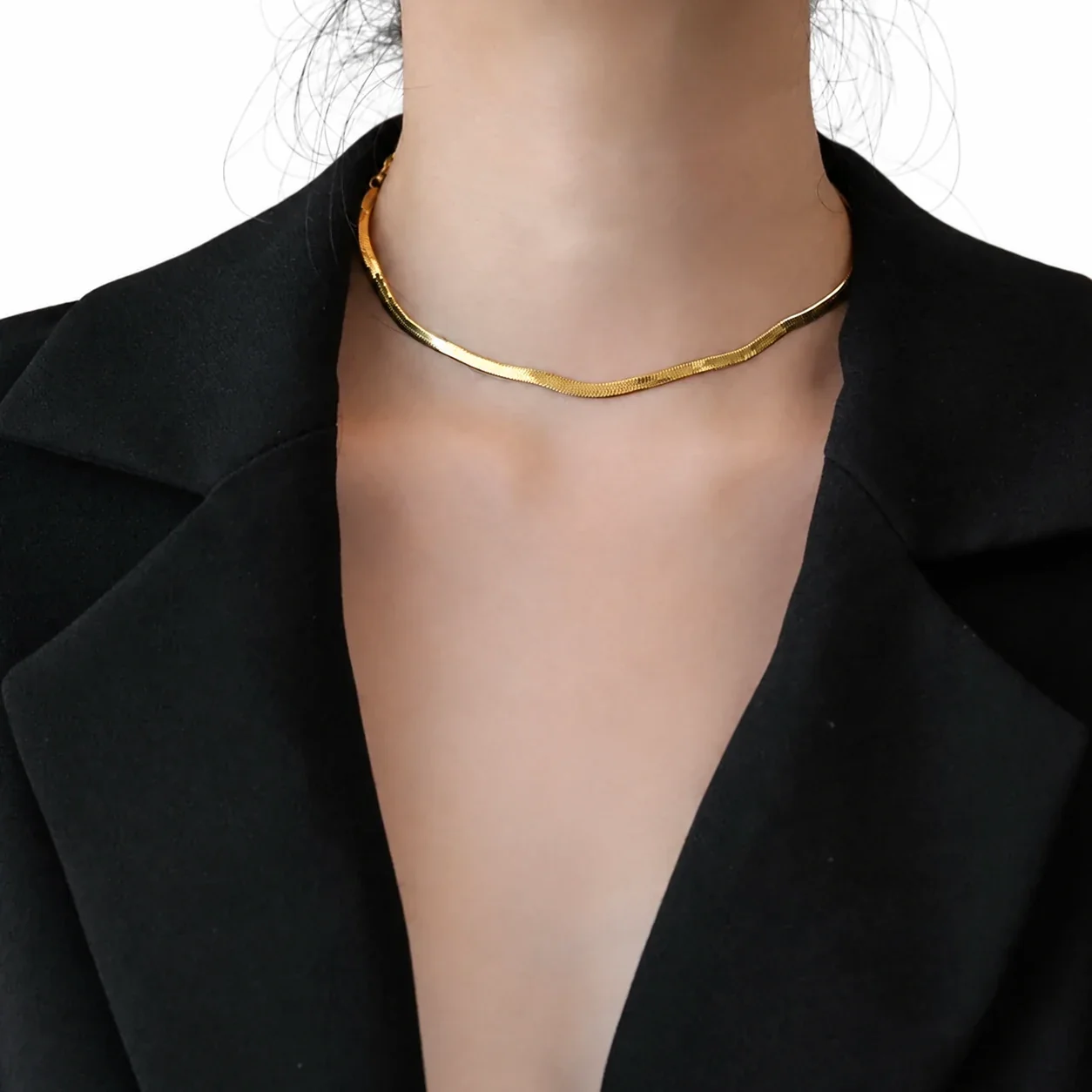 Slangenketting met hartvormig verlengstuk, verguld roestvrij staal productfoto