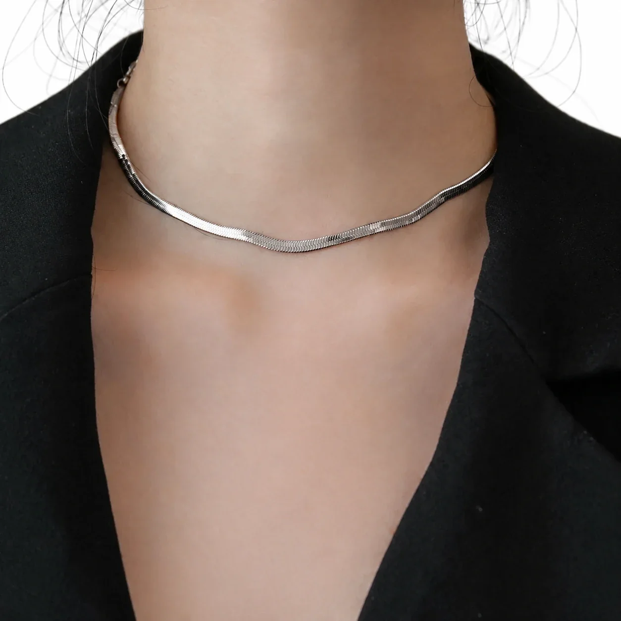 Slangenketting met hartvormig verlengstuk, verguld roestvrij staal productfoto