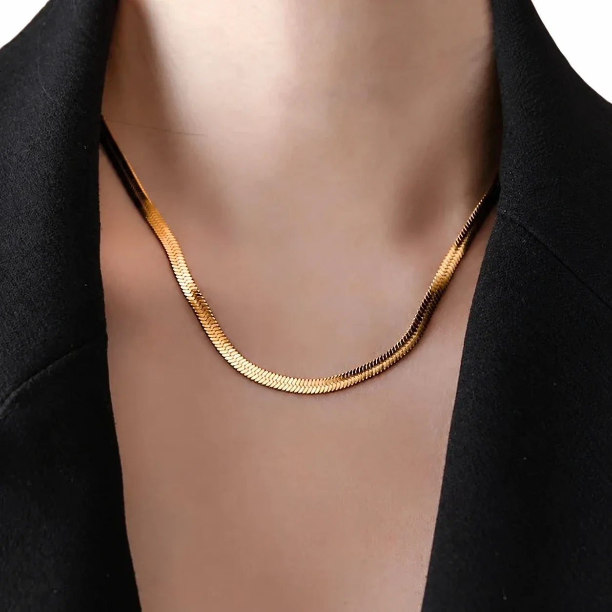 Slangenketting met hartvormig verlengstuk, verguld roestvrij staal productfoto