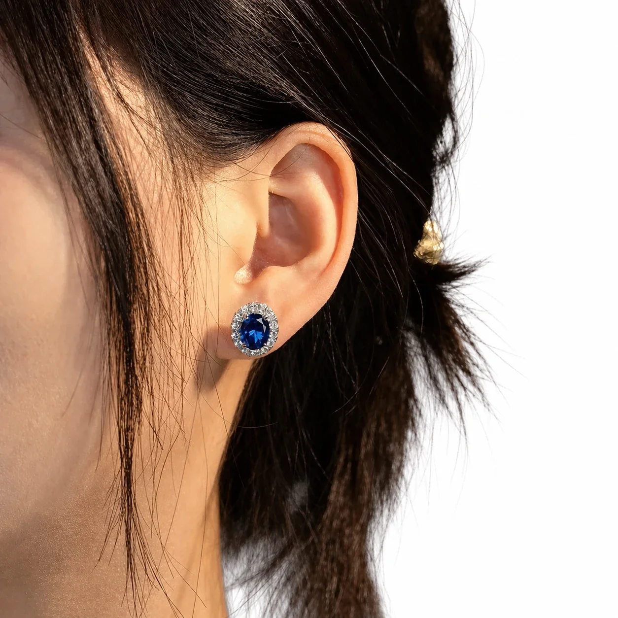 Radiant Silver-Plated Blue Oval Halo Stud Earrings